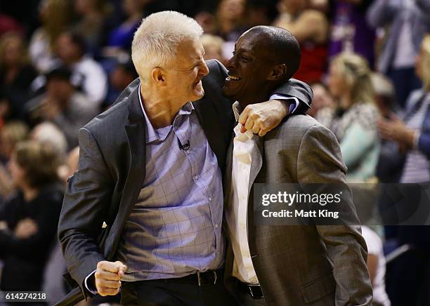 Kings coach Andrew Gaze and assistant coach Lanard Copeland celebrate victory during the round two NBL match between the Illawarra Hawks and the...