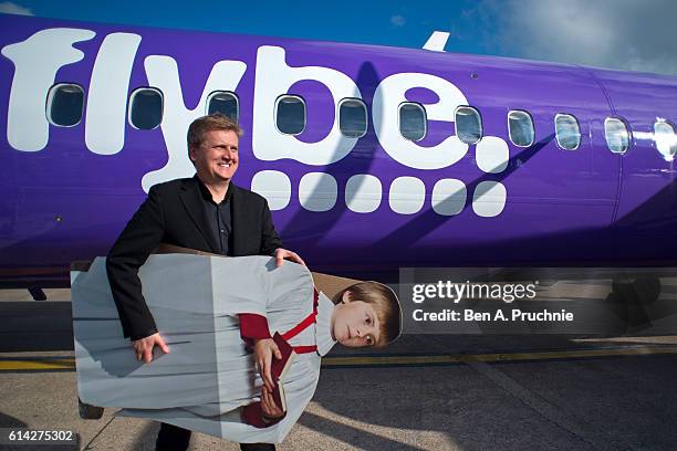 Aled Jones departs a FLYBE flight after launching his new Christmas album "One Voice At Christmas" where he performed Walking In The Air and...