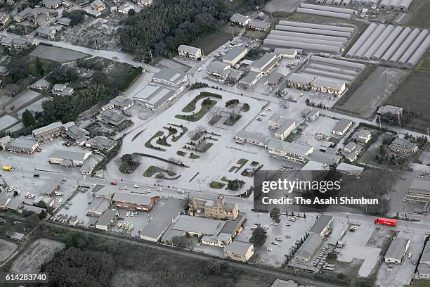 In this aerial image, Aso City is covered with volcanic ashes after the eruption of Mount Aso on October 8, 2016 in Aso, Kumamoto, Japan. It was the...