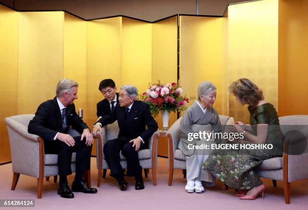 Belgian King Philippe , Japanese Emperor Akihito , Japanese Empress Michiko and Belgian Queen Mathilde talk after a concert at Kioi Hall in Tokyo, on...