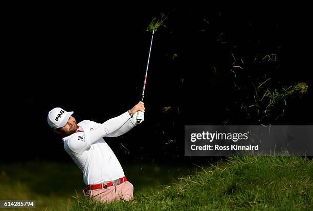 Andy Sullivan of England plays his second shot on the sixth hole during the first round of the British Masters at The Grove on October 13, 2016 in...