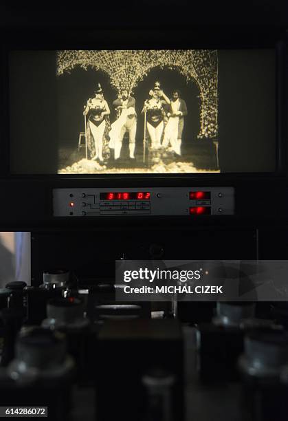 Photo taken on October 13, 2016 at the Czech national film archives in Prague shows a frame of the silent two-minute film 'Match de prestidigitation'...