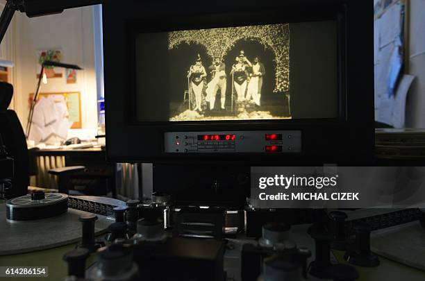 Photo taken on October 13, 2016 at the Czech national film archives in Prague shows a frame of the silent two-minute film 'Match de prestidigitation'...