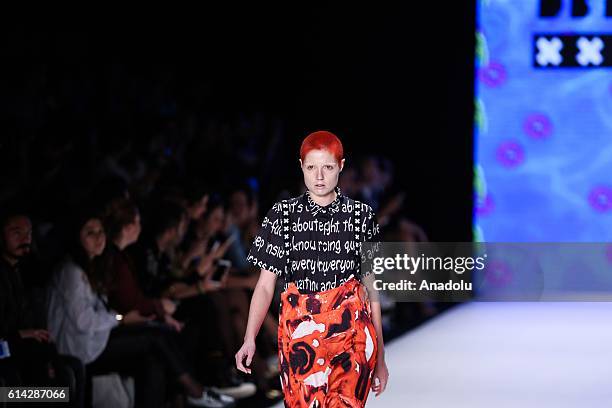 Model walks on the stage as she presents the designer Deniz Berdan's collection during the Mercedes-Benz Fashion Week Spring/Summer 2017 at the Zorlu...