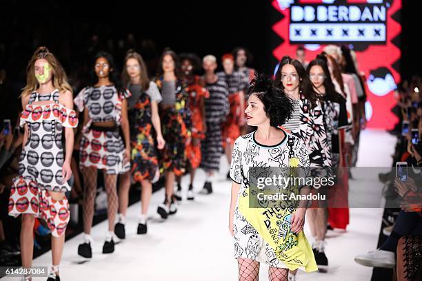 Models walk on the stage as they present the designer Deniz Berdan's collection during the Mercedes-Benz Fashion Week Spring/Summer 2017 at the Zorlu...