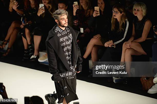 Ruzgar Erkoclar walks the runway at the DB Berdan show during Mercedes-Benz Fashion Week Istanbul at Zorlu Center on October 13, 2016 in Istanbul,...