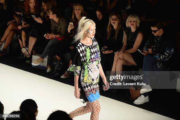 Model walks the runway at the DB Berdan show during Mercedes-Benz Fashion Week Istanbul at Zorlu Center on October 13, 2016 in Istanbul, Turkey.