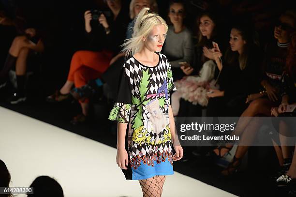 Model walks the runway at the DB Berdan show during Mercedes-Benz Fashion Week Istanbul at Zorlu Center on October 13, 2016 in Istanbul, Turkey.