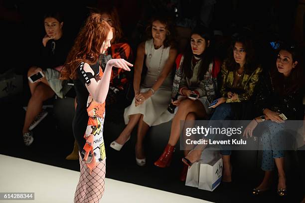 Model walks the runway at the DB Berdan show during Mercedes-Benz Fashion Week Istanbul at Zorlu Center on October 13, 2016 in Istanbul, Turkey.