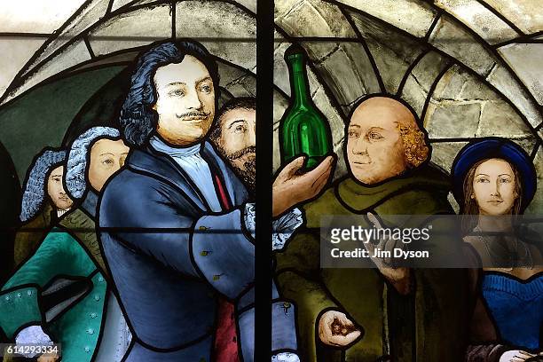 Stained glass window depicting French Benedictine monk Dom Perignon at the Moet et Chandon Champagne house, on the famous Avenue de Champagne, on...