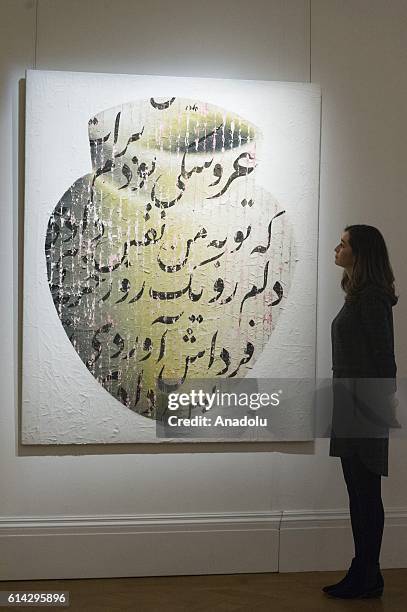 The artwork titled 'For You I Was a Puppet' of Iranian artist Farhad Moshiri with an estimate of £80,000-100,000 is displayed as part of a week of...