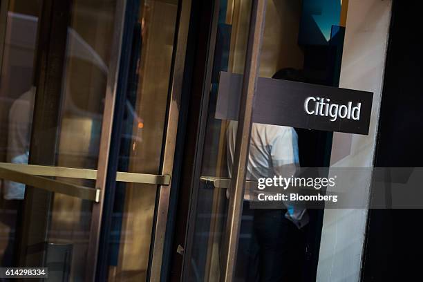 Signage is displayed on the door of a Citigroup Inc. Bank branch in New York, U.S., on Friday, Oct. 7, 2016. Citigroup Inc. Is scheduled to release...