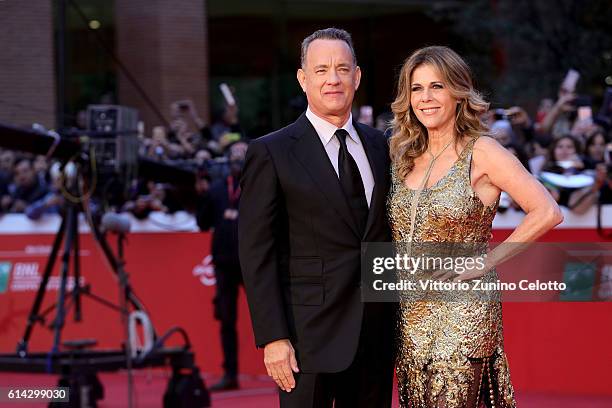 Tom Hanks and Rita Wilson walk a red carpet on October 13, 2016 in Rome, Italy.