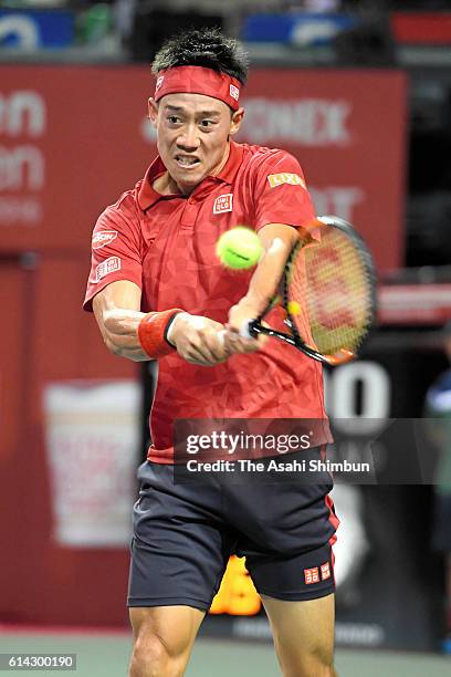 Kei Nishikori of Japan plays a backhand during the men's singles first round match against Donald Young of USA on day one of Rakuten Open 2016 at...