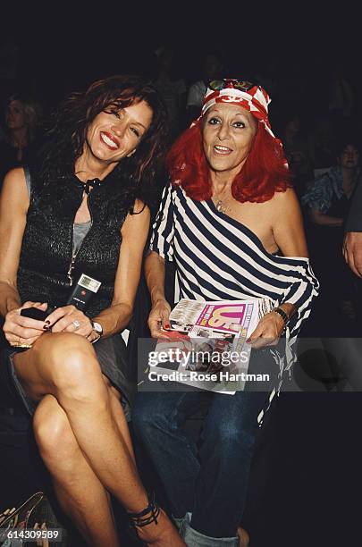 American fashion model Janice Dickinson with American fashion designer Patricia Field at the Carlos Miele Spring 2003 fashion show, New York City,...