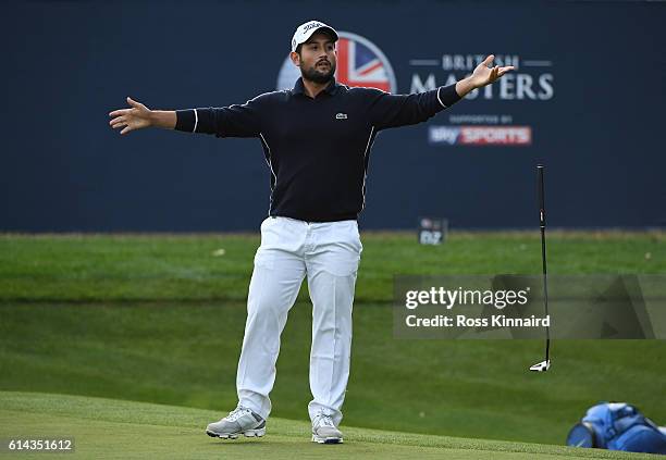 Alexander Levy of France reacts after an attempted eagle putt comes up short during the first round of the British Masters at The Grove on October...