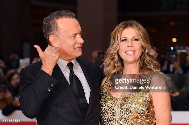 Tom Hanks and Rita Wilson walk a red carpet at Auditorium Parco Della Musica on October 13, 2016 in Rome, Italy.