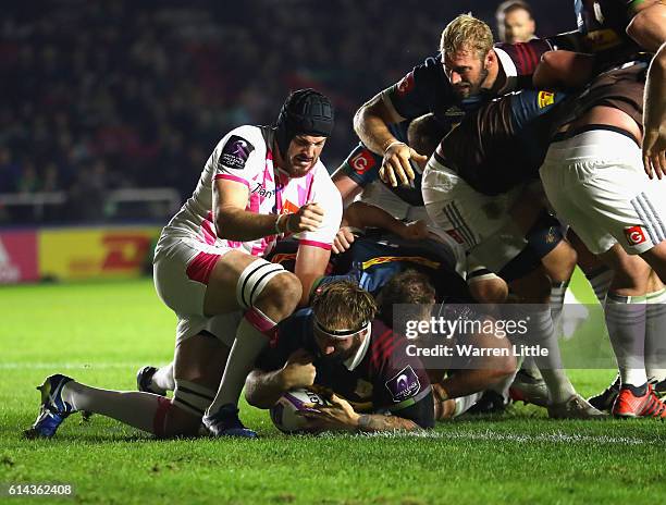 Joe Marler of Harlequins scores the opening try during the European Rugby Challenge Cup match between Harlequins v Stade Francais Paris on October...
