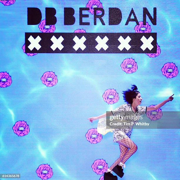 Models cheer during the DB Berdan show during Mercedes-Benz Fashion Week Istanbul at Zorlu Center on October 13, 2016 in Istanbul, Turkey.