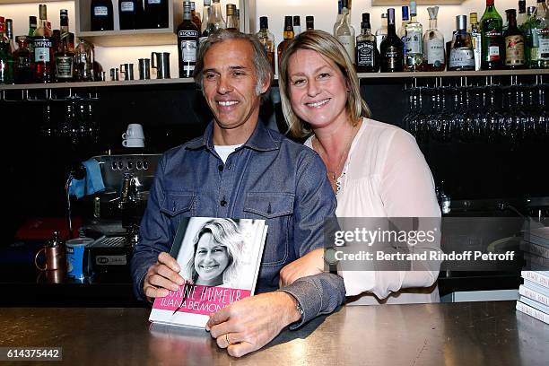 Paul Belmondo and his wife Luana Belmondo attend Luana Belmondo presents her book "Mes Recettes Bonne Humeur" at Ida Restaurant in Paris on October...