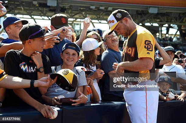 Padres manager signs autographs for fans during the Gatorade All-Star Workout Day at PETCO Park in San Diego, CA.