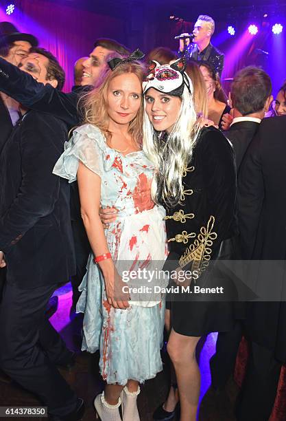 Martha Ward and Princess Beatrice of York attend the Unicef UK Halloween Ball, raising vital funds to support Unicef's life-saving work for Syrian...