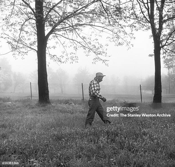 Floyd Patterson takes a walk at his training camp on May 12, 1956 at Greenwood Lake, New York.