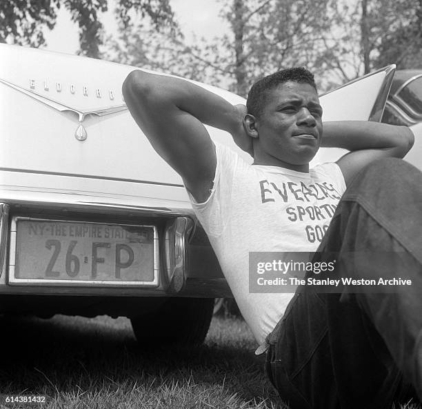 Floyd Patterson poses with his Cadillac Eldorado at his training camp on May 12, 1956 at Greenwood Lake, New York.