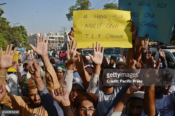 Pakistani Sunni Muslims from a religious group protest against Asia Bibi, a Christian woman facing death sentence for blasphemy, in Lahore....