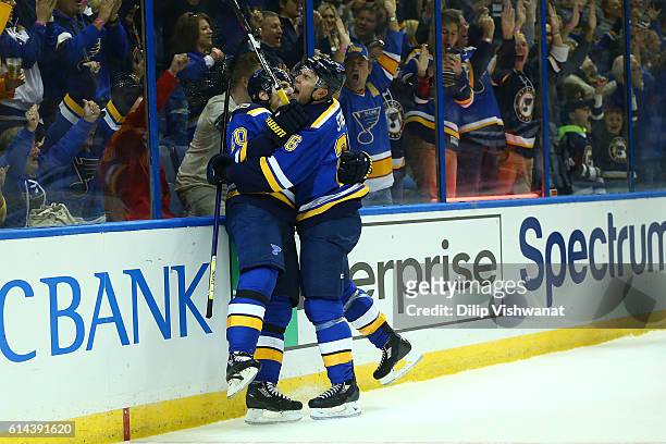 October 13: Alexander Steen and Paul Stastny of the St. Louis Blues celebrate Steen's goal against the Minnesota Wild in the first period at the...