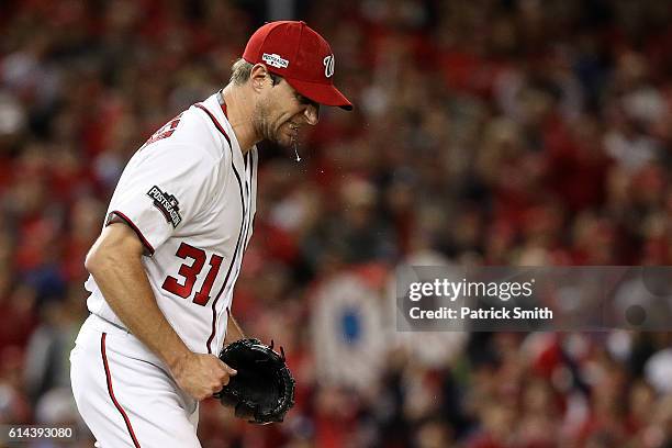 Max Scherzer of the Washington Nationals celebrates after throwing a strike out for the second strike out of the fourth inning against the Los...