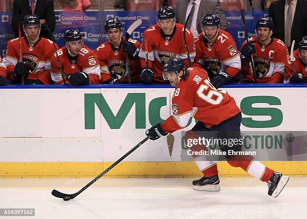 Jaromir Jagr of the Florida Panthers looks to pass during Opening Night of the 2016-2017 NHL Season against New Jersey Devils at BB&T Center on...