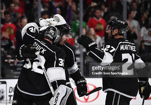 Los Angeles Kings Defenseman Drew Doughty [6495] celebrates the victory with Los Angeles Kings Goalie Jonathan Quick [5348] and Los Angeles Kings...