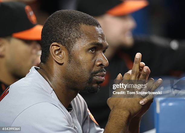 Michael Bourn of the Baltimore Orioles looks on from the top step of the dugout during MLB game action against the Toronto Blue Jays on September 29,...