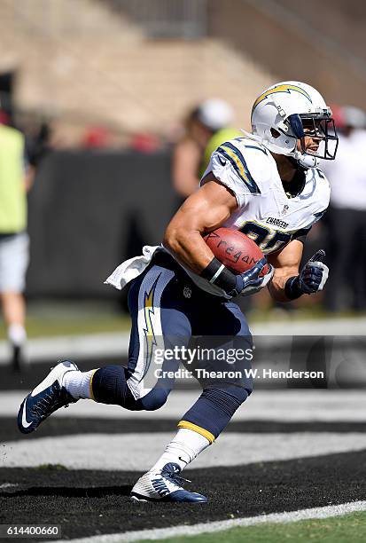 Kenneth Farrow of the San Diego Chargers warms up during pregame warm ups prior to playing the Oakland Raiders in an NFL football game at...