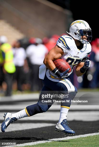 Kenneth Farrow of the San Diego Chargers warms up during pregame warm ups prior to playing the Oakland Raiders in an NFL football game at...