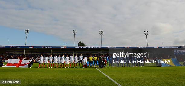 The players of England and Bosnia and Herzegovina line up for the national anthems during the UEFA European U21 Championship qualifier match between...