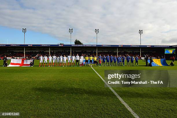 The players of England and Bosnia and Herzegovina line up for the national anthems during the UEFA European U21 Championship qualifier match between...