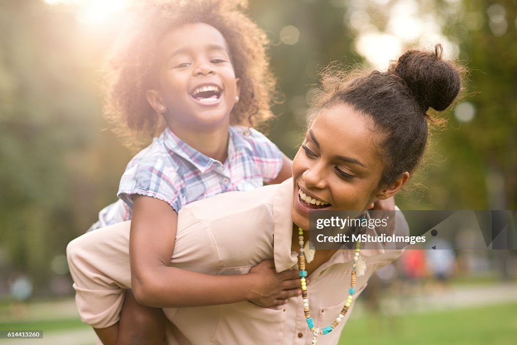 Happy family enjoying in the nature.