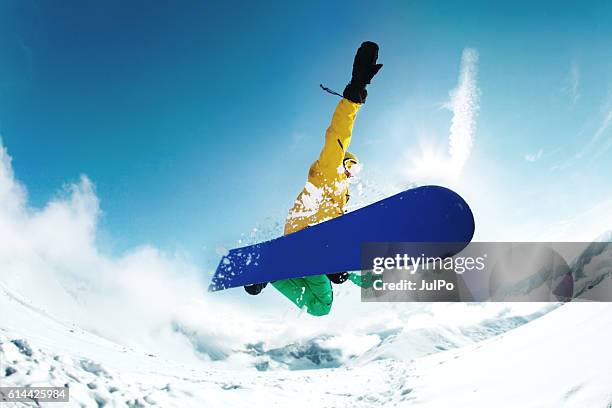 jump - extreme snowboarding stock pictures, royalty-free photos & images