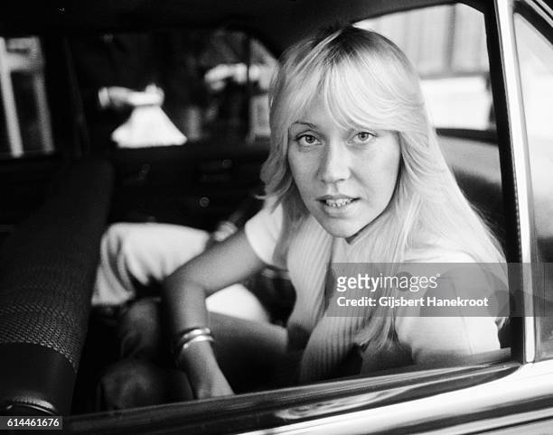 Agnetha Faltskog of Abba arrives in a car to appear on a Dutch TV show 'een van de acht', The Hague, Netherlands, November 23, 1976.