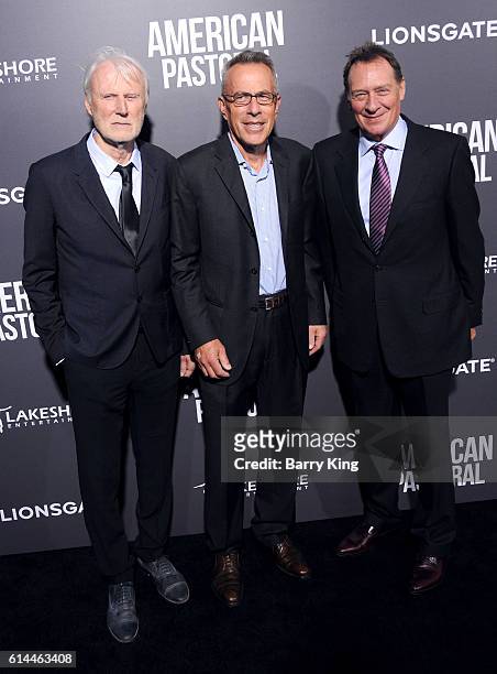 Producers Andre Lamal, Tom Rosenberg and Gary Lucchesi attend the premiere of Lionsgate's' 'American Pastoral' at Samuel Goldwyn Theatre on October...