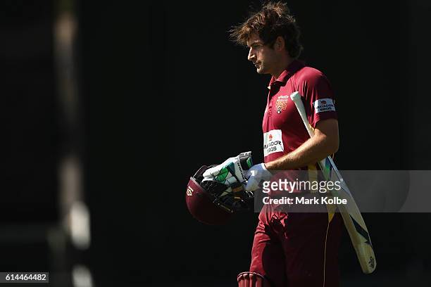 Joe Burns of the Bulls looks dejected after being dismissed during the Matador BBQs One Day Cup match between Queensland and New South Wales at...