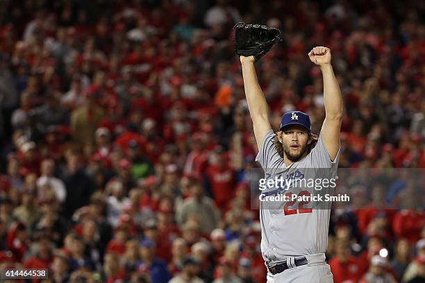 Clayton Kershaw of the Los Angeles Dodgers celebrates after winning game five of the National League Division Series over the Washington Nationals...