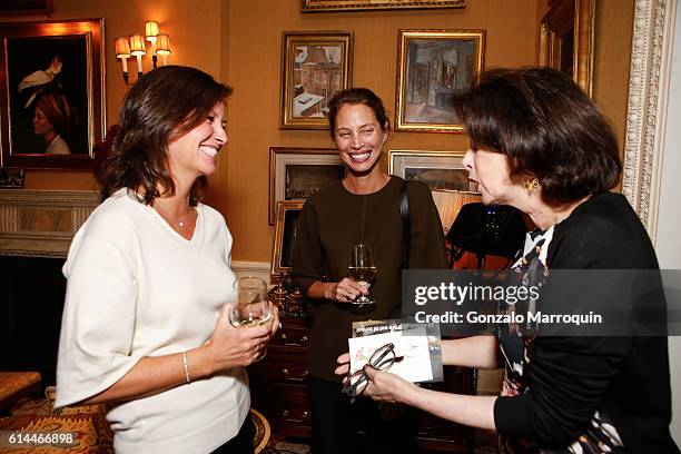 Dayle Haddon;Kelly Burns and Christy Turlington Burns at the WomenOne Dinner on October 13, 2016 in New York City.