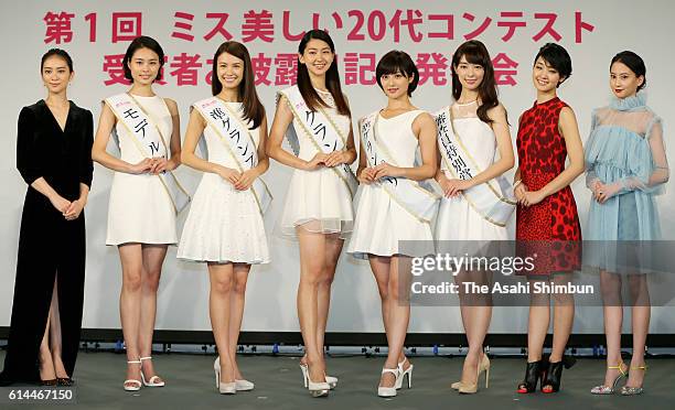 Miss 20s contestants pose for photographs with actress Emi Takei , Ayame Goriki and Maiko Kawakita during the Miss 20s Contest award ceremony on...