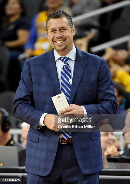 Head coach David Joerger of the Sacramento Kings smiles during a preseason game against the Los Angeles Lakers at T-Mobile Arena on October 13, 2016...
