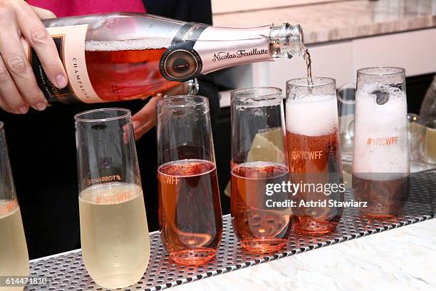 View of the NYWFF branded champagne flutes at Chicken Coupe hosted by Whoopi Goldberg and Andrew Carmellini at The William Vale on October 13, 2016...