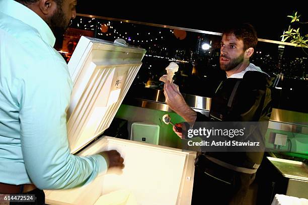 Chef Mark Rosati serves a guest ice cream at Chicken Coupe hosted by Whoopi Goldberg and Andrew Carmellini at The William Vale on October 13, 2016 in...