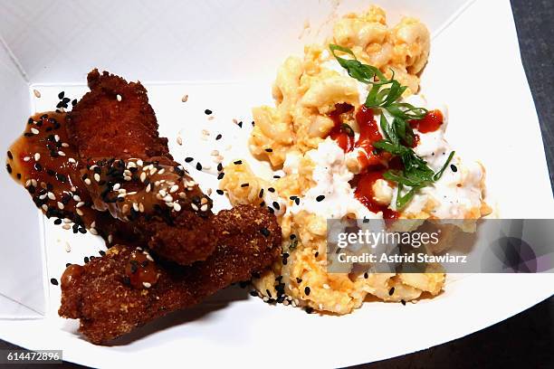 View of Chef Hernan Heras' Fortune Cookie Crusted Chicken Fingers attends Chicken Coupe hosted by Whoopi Goldberg and Andrew Carmellini at The...